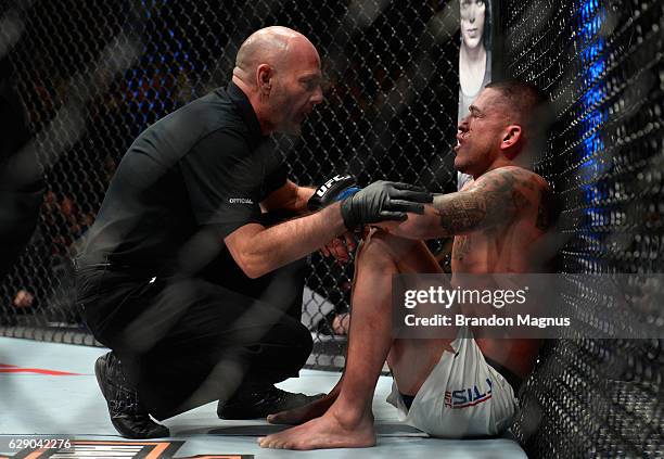 Anthony Pettis reacts to his loss to Max Holloway in their interim UFC featherweight championship bout during the UFC 206 event inside the Air Canada...