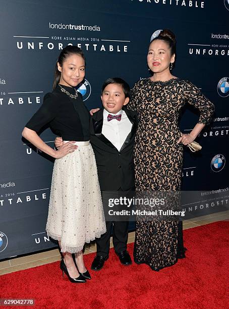 Actors Albert Tasi, Krista Marie Yu and Suzy Nakamura attend the 15th Annual Unforgettable Gala at The Beverly Hilton Hotel on December 10, 2016 in...