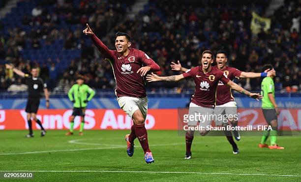 Silvio Romero of Club America celebrates scoring his team's second goal with team mates during the FIFA Club World Cup second round match between...
