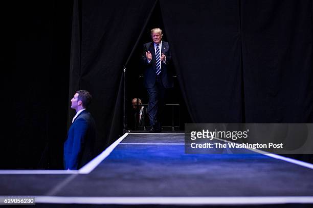President-Elect Donald J. Trump walks out to speak at a "USA Thank You Tour 2016" event at the DeltaPlex in Grand Rapids, Mi. On Friday, Dec. 09,...