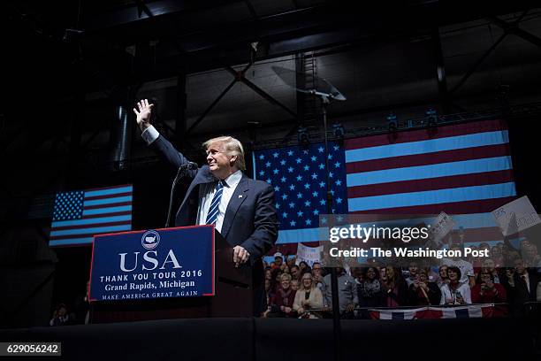 President-Elect Donald J. Trump waves as he walks out to speak at a "USA Thank You Tour 2016" event at the DeltaPlex in Grand Rapids, Mi. On Friday,...