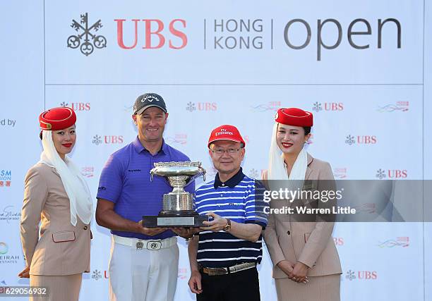 Sam Brazel of Australia poses with the trophy after winning the UBS Hong Kong Open at The Hong Kong Golf Club on December 11, 2016 in Hong Kong, Hong...