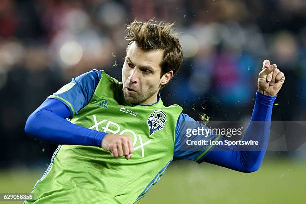 Andreas Ivanschitz of Seattle Sounders scores his penalty shot against Toronto FC of the MLS Cup Final on December 10 at BMO Field in Toronto, ON,...