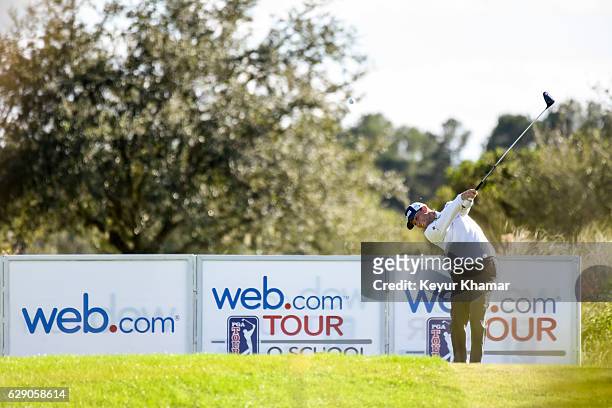 Luke Guthrie tees off on the 18th hole of the Panther Lake Course during the third round of Web.com Tour Q-School at Orange County National Golf...