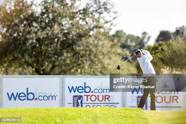 Luke Guthrie tees off on the 18th hole of the Panther Lake Course during the third round of Web.com Tour Q-School at Orange County National Golf...