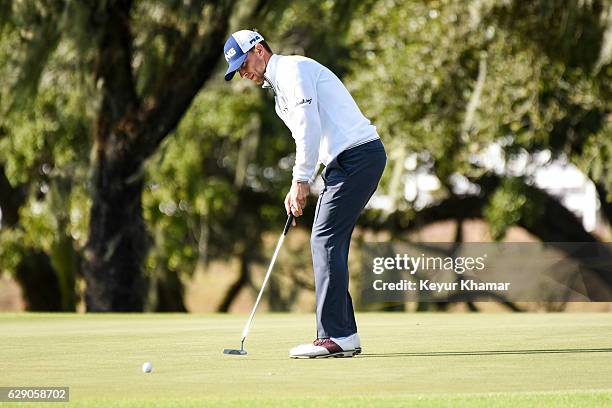 Luke Guthrie putts on the 18th hole green of the Panther Lake Course during the third round of Web.com Tour Q-School at Orange County National Golf...