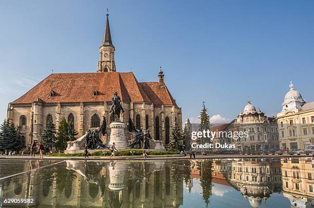 Romania, Transylvania, Cluj Napoca City, Mathia Rex Monument, St. Michael's Church, Unirii Square.