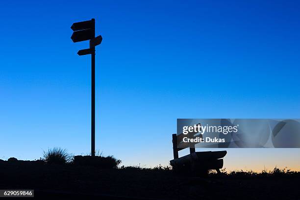 Bench and guidepost in Switzerland.