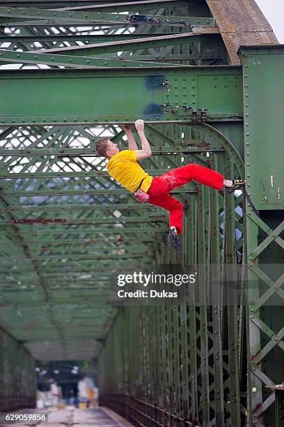 Urban climbing on a bridge.