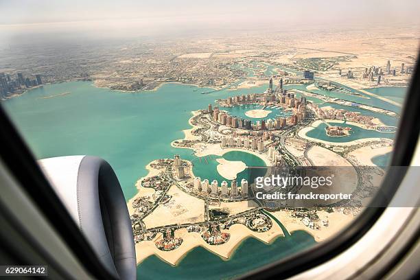 doha aerial view from the airplane - doha stockfoto's en -beelden