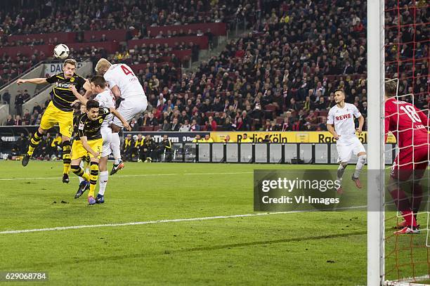 Matthias Ginter of Borussia Dortmund, Marc Bartra of Borussia Dortmund, Dominique Heintz of 1.FC Koln, Frederik Sorensen of 1.FC Koln, Salih Ozcan of...