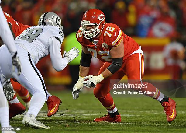 Offensive tackle Eric Fisher of the Kansas City Chiefs gets set on the line of scrimmage against the Oakland Raiders during the first half on...