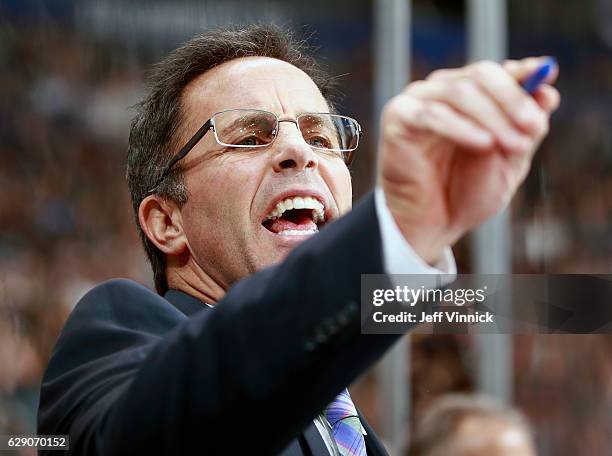 Assistant coach Doug Lidster of the Vancouver Canucks looks on from the bench during their NHL game against the Anaheim Ducks at Rogers Arena...