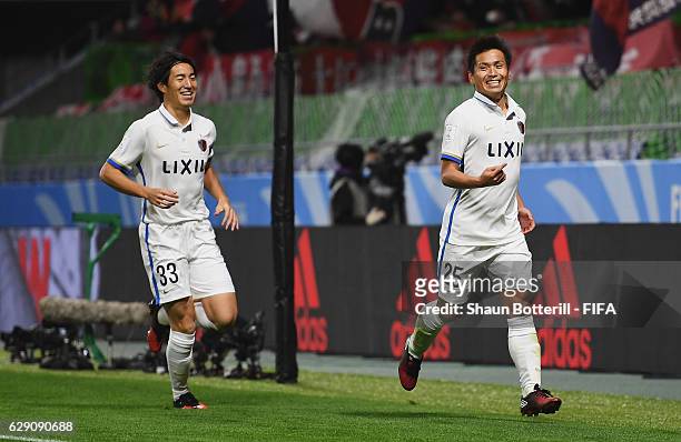 Yasushi Endo of Kashima Antlers celebrates scoring the opening goal during the FIFA Club World Cup second round match between Mamelodi Sundowns and...