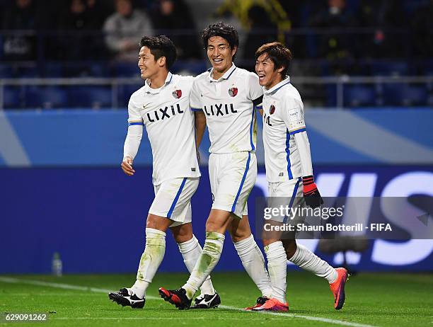 Mu Kanazaki of Kashima Antlers celebrates scoring his team's second goal with team mates during the FIFA Club World Cup second round match between...