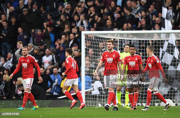 Nicklas Bendtner of Nottingham Forest and team mates look dejected after Nicklas Bendtner scores an own goal for Derby County's first during the Sky...