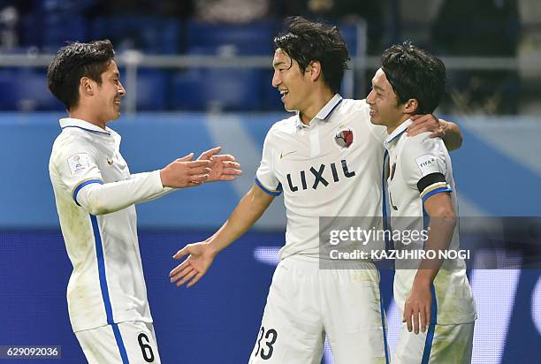 Kashima Antlers midfielder Mu Kanazaki celebrates his goal with teammates during the Club World Cup football match between Kashima Antlers and...