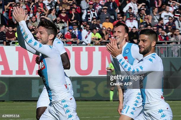 Napoli's Belgian forward Dries Mertens celebrates with Napoli's Romanian defender Vlad Chiriches and Napoli's Italian forward Lorenzo Insigne after...