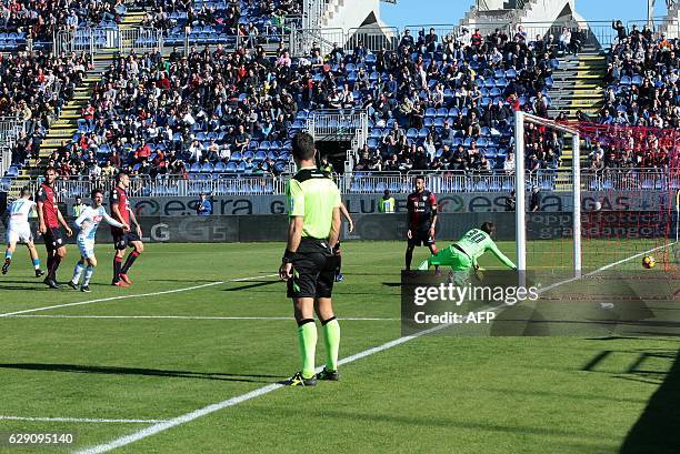Napoli's Belgian forward Dries Mertens scores a goal during the Italian Serie A football match between Cagliari and Napoli at the Sant'Elia Stadium...