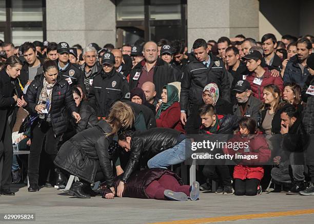 Relatives mourn the police officers killed in yesterday's blast on December 11, 2016 in Istanbul, Turkey. According to Interior Minister Suleyman...