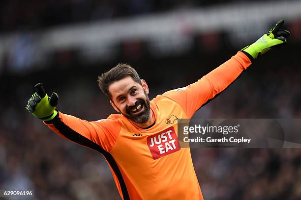 Scott Carson of Derby County celebrates after Tom Ince of Derby County scores his side's second during the Sky Bet Championship match between Derby...
