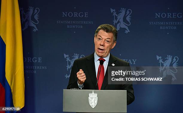 This year's Nobel Peace Prize laureate Colombian President Juan Manuel Santos addresses a news conference after talks with Norway's Prime Minister at...