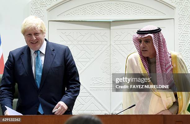 Saudi Minister of Foreign Affairs Adel al-Jubeir and British Secretray of State for Foreign and Commonwealth Affairs Boris Johnson arrive for a joint...