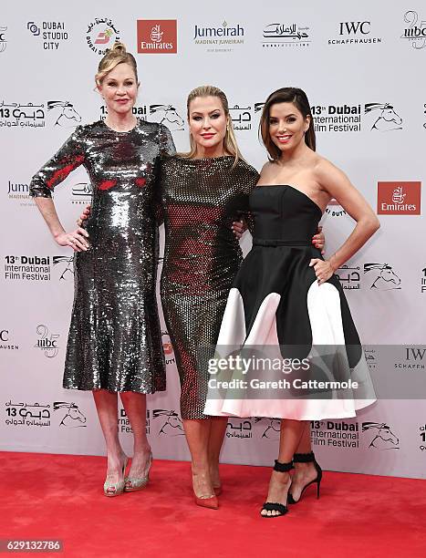 Melanie Griffith, Anastacia and Eva Longoria attend the "Solitaire" red carpet during day five of the 13th annual Dubai International Film Festival...