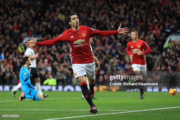 Henrikh Mkhitaryan of Manchester United celebrates scoring the opening goal during the Premier League match between Manchester United and Tottenham...