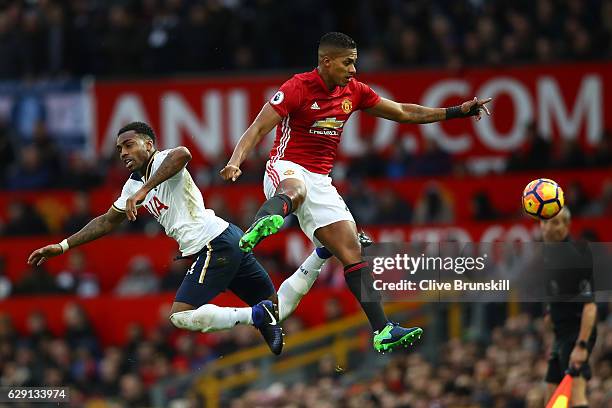 Antonio Valencia of Manchester United and Danny Rose of Tottenham Hotspur compete for the ball during the Premier League match between Manchester...