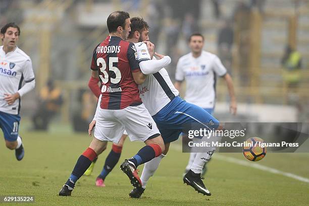 Riccardo Saponara of Empoli FC comptes the ball with Vasilis Torosidis of Bologna FC during the Serie A match between Bologna FC and Empoli FC at...