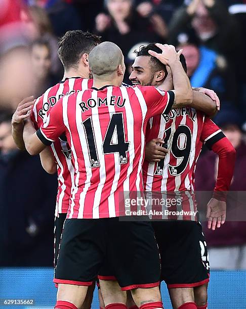 Sofiane Boufal of Southampton celebrates with team mates after he scores his side's first goal during the Premier League match between Southampton...