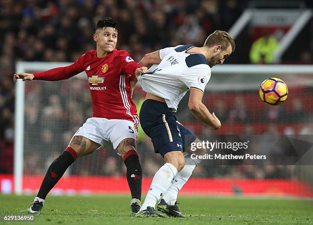 Marcos Rojo of Manchester United in action with Harry Kane of Tottenham Hotspur during the Premier League match between Manchester United and...