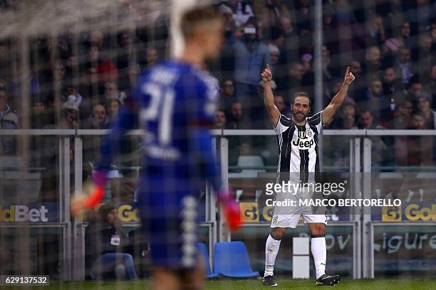 Juventus' forward Gonzalo Higuain from Argentina celebrates after scoring during the Italian Serie A football match Torino Vs Juventus on December...