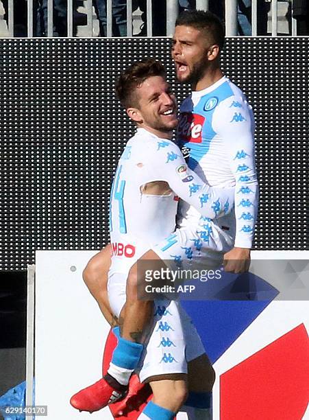 Napoli's forward from Belgium Dries Mertens celebrates with teammate Lorenzo Insigne after scoring a goal during the Italian Serie A football match...
