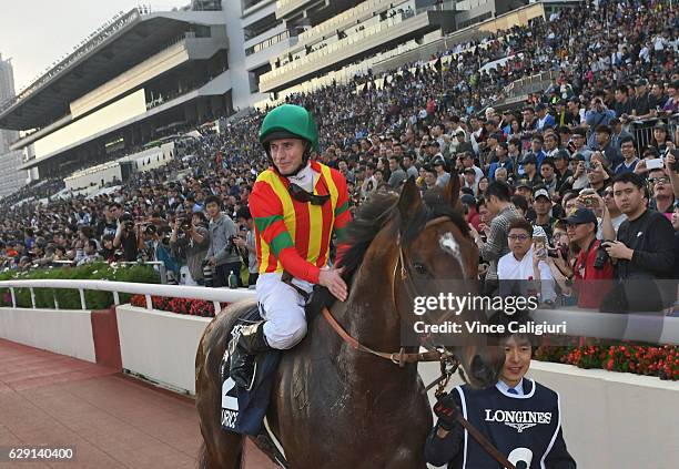 Ryan Moore riding Maurice of Japan after winning Race 8 the Longines Hong Kong Cup during Hong Kong International Racing at Sha Tin Racecourse on...