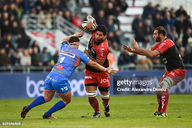 Wyn Jones of Scarlets and Romain Taofifenua of Toulon and Mamauka Gorgodze of Toulon during the European Champions Cup match between Toulon and...