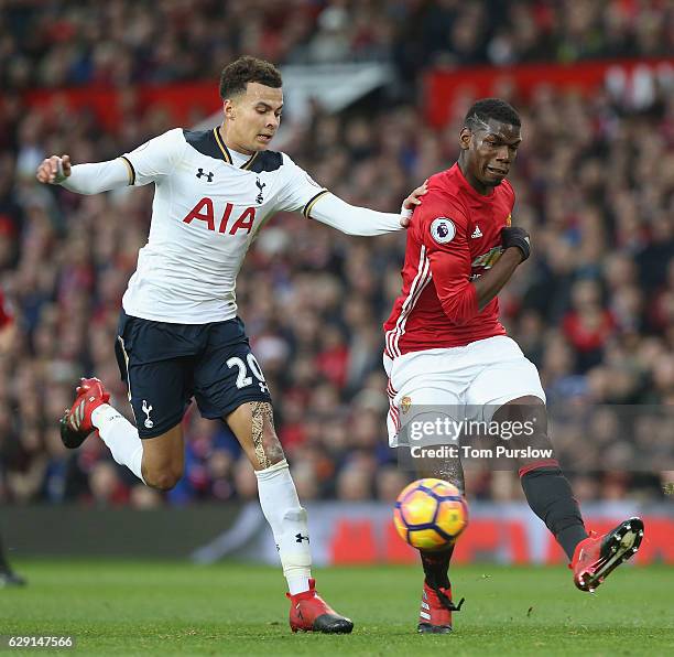 Paul Pogba of Manchester United in action with Dele Alli of Tottenham Hotspur during the Premier League match between Manchester United and Tottenham...