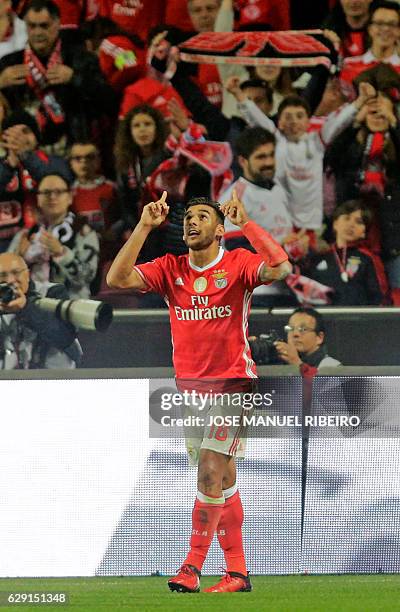 Benfica's Argentine midfielder Eduardo Salvio celebrates after scoring during the Portuguese league football match SL Benfica vs Sporting CP at the...