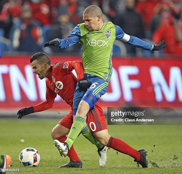 Osvaldo Alonso of the Seattle Sounders battles against Sebastian Giovinco of the Toronto FC during the 2016 MLS Cup at BMO Field on December 10, 2016...