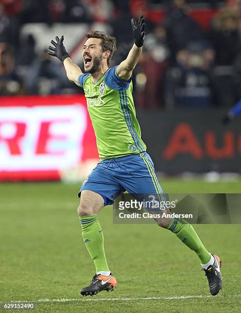 Brad Evans of the Seattle Sounders celebrates the championship win against the Toronto FC in the 2016 MLS Cup at BMO Field on December 10, 2016 in...
