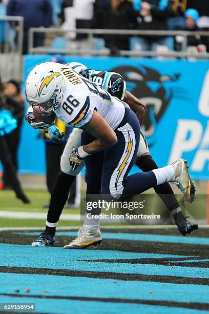 San Diego Chargers tight end Hunter Henry makes a scoring catch covered by Carolina Panthers cornerback Daryl Worley during the second quarter...
