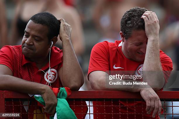 Fans of Internacional react during a match between Fluminense and Internacional as part of Brasileirao Series A 2016 at Giulite Coutinho Stadium on...