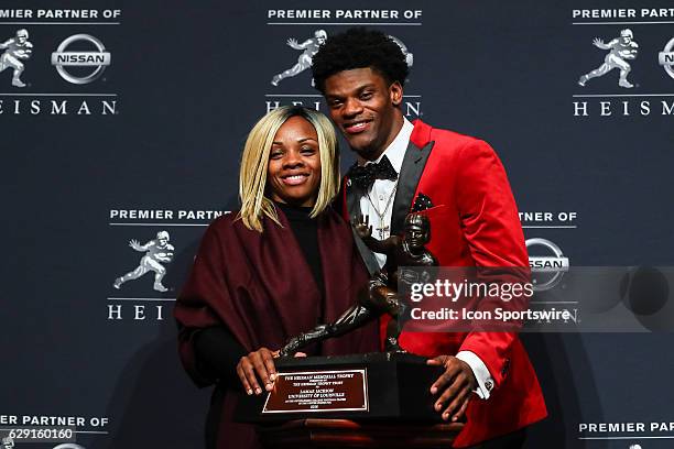 Heisman Trophy winner University of Louisville quarterback Lamar Jackson with his mother Felicia Jones after winning the 81st Annual Heisman Trophy...