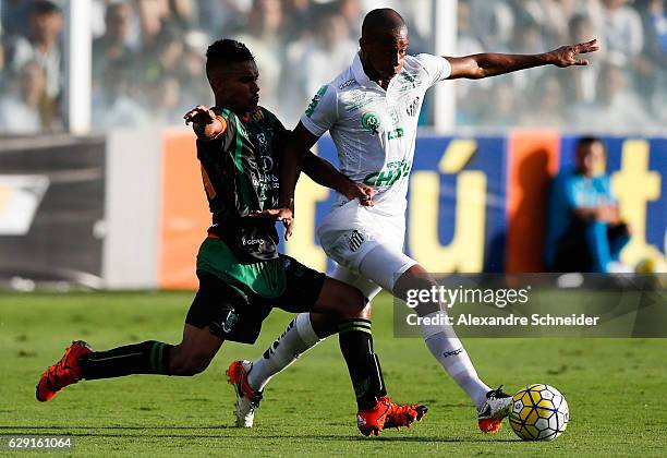 Renato Bruno of America MG and Copete of Santos in action during the match between Santos and America MG for the Brazilian Series A 2016 at Vila...