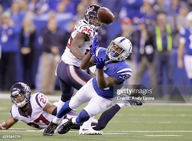 Hilton of the Indianapolis Colts catches a pass during the fourth quarter of the game against the Indianapolis Colts at Lucas Oil Stadium on December...