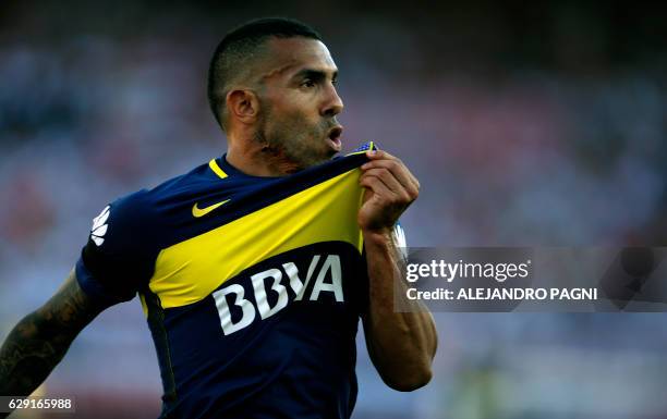 Boca Juniors' forward Carlos Tevez celebrates after scoring the team's second goal against River Plate during their Argentina First Division football...