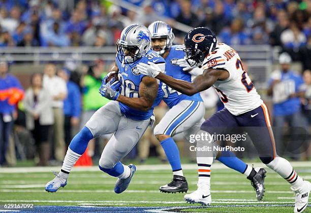 Detroit Lions running back Dwayne Washington runs the ball against the Chicago Bears during the first half of an NFL football game in Detroit,...