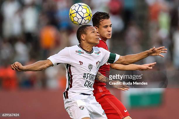 Wellington of Fluminense struggles for the ball with Gustavo of Internacional during a match between Fluminense and Internacional as part of...