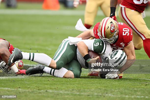 Nick Bellore of the San Francisco 49ers hits Bryce Petty of the New York Jets during their NFL game at Levi's Stadium on December 11, 2016 in Santa...